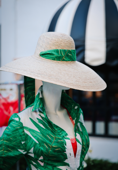 Sarah Bray Bermuda hat with green palm leaf printed cotton ribbon and matching green palm leaf printed cotton dress by Ala von Auersperg