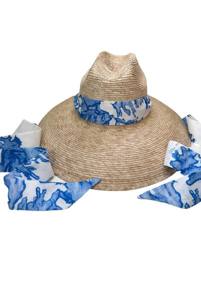 Straw sun hat with a large brim and blue coral printed cotton band by Sarah Bray Bermuda and Ala von Auersperg