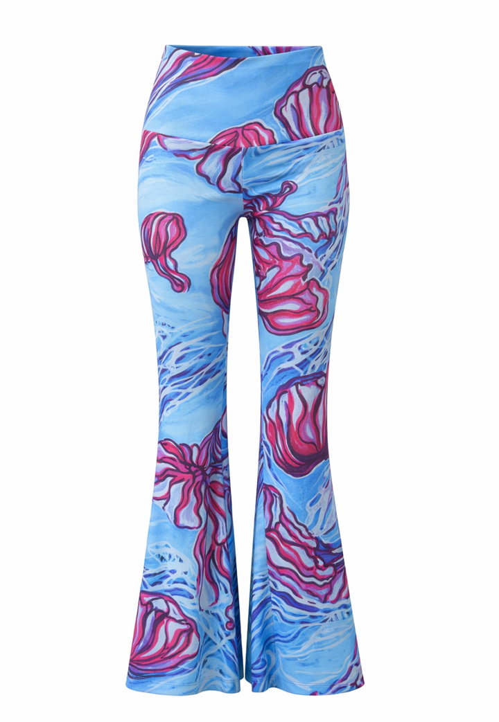 Flared pants with pink and blue nautical pattern on a white background