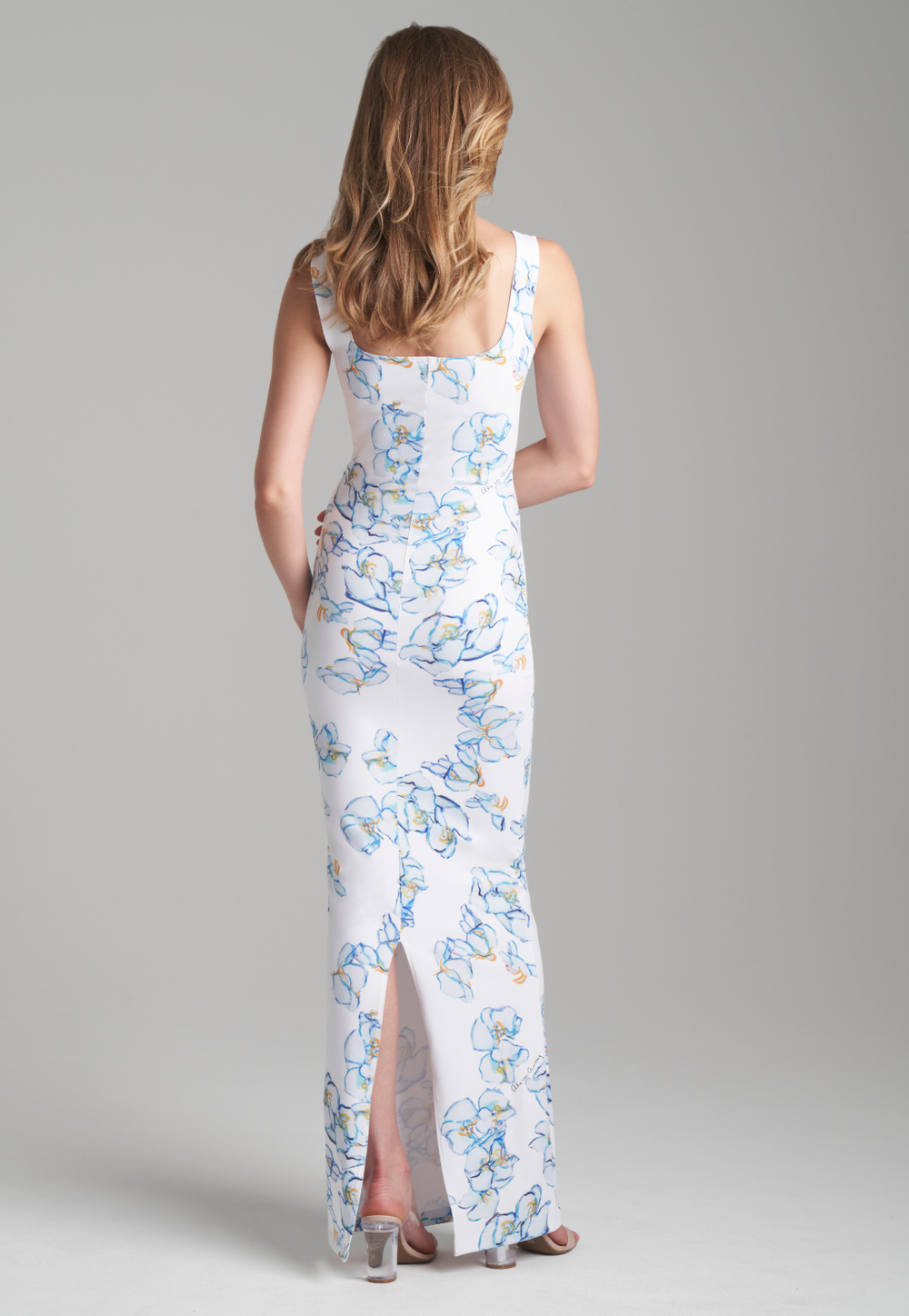 Woman wearing floral printed long stretch knit dress by Ala von Auersperg for spring 2024