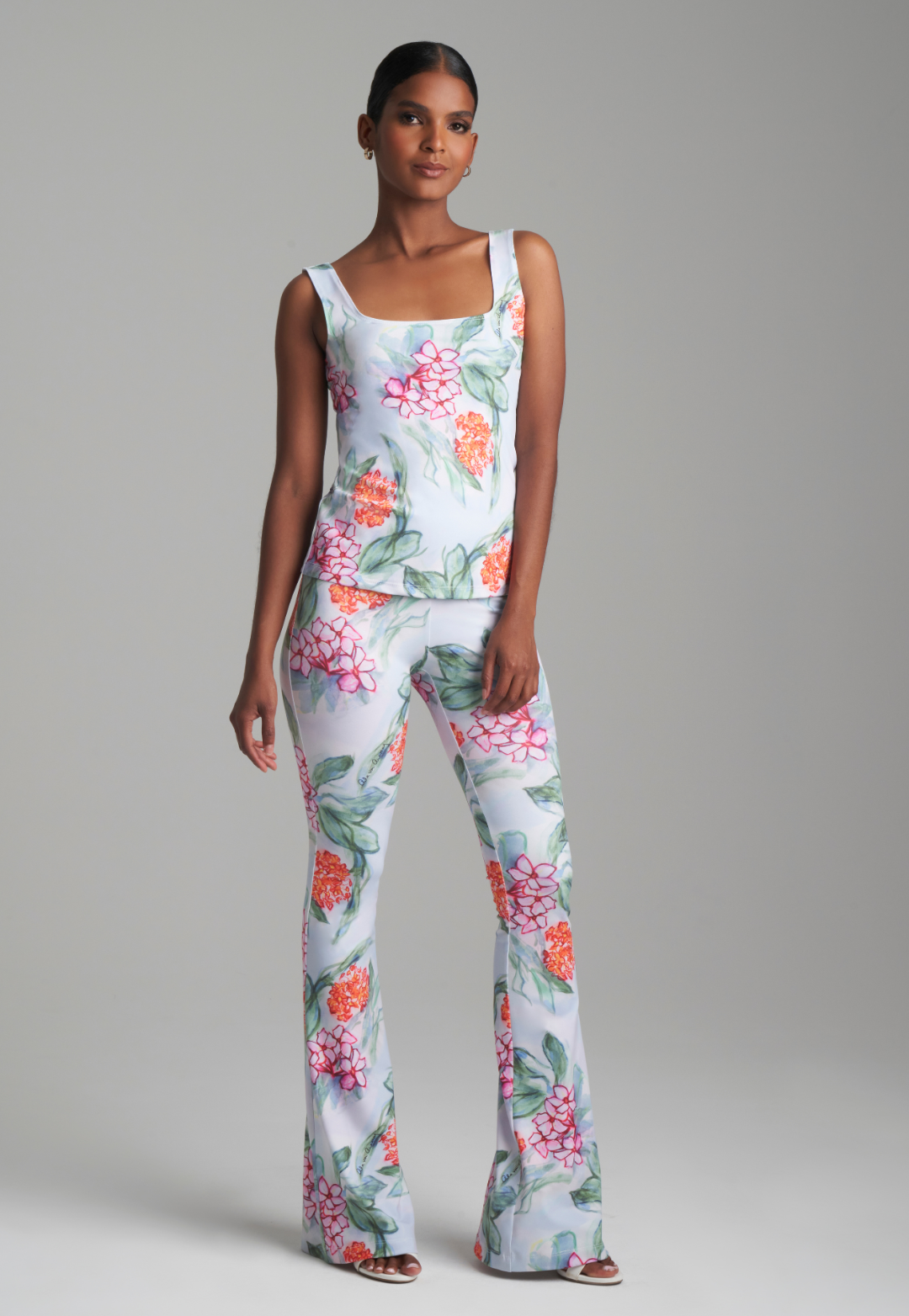 Woman wearing matching floral tank top and pants by Ala von Auersperg for spring summer 2024