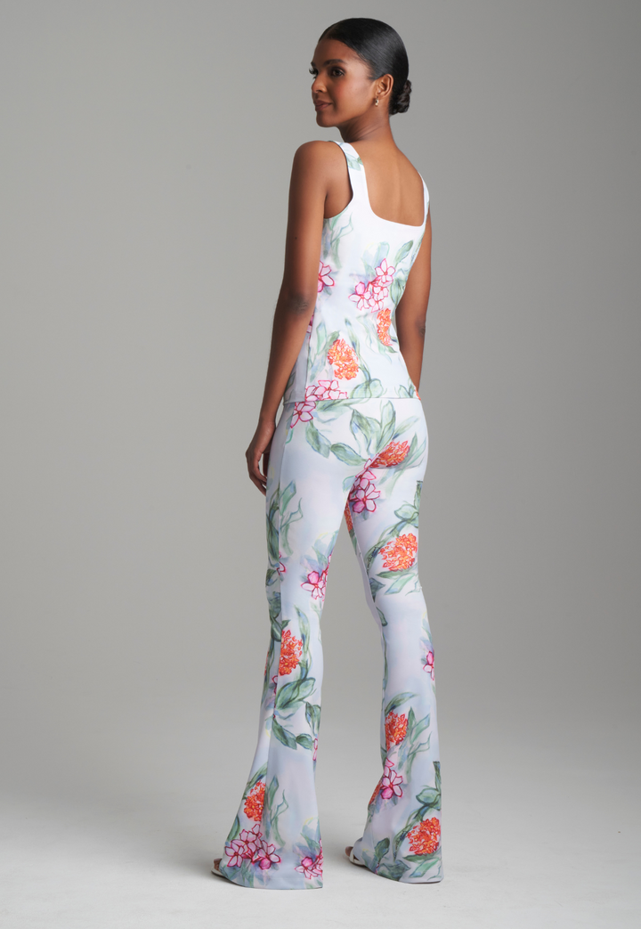 Woman wearing scoop neck printed stretch knit tank top with matching pants by Ala von Auersperg 
