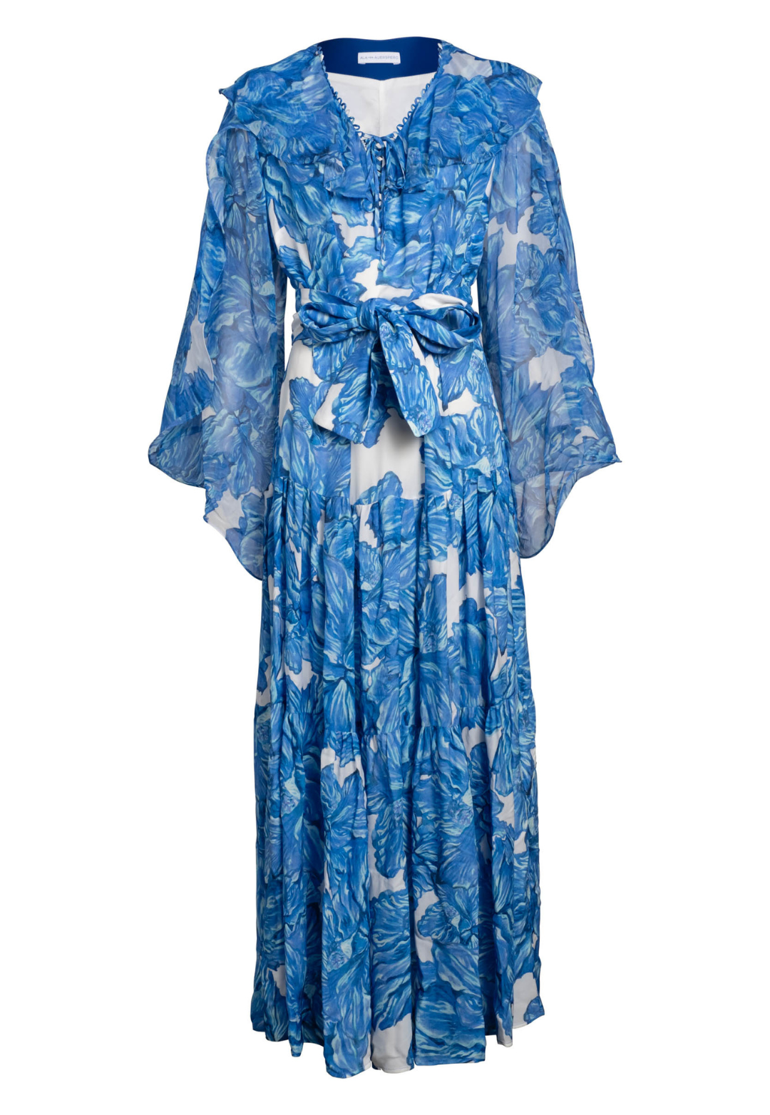 Flat image of a blue floral printed silk dress with sheer sleeves and self tie belt by designer Ala von Auersperg for women's luxury travel fashion