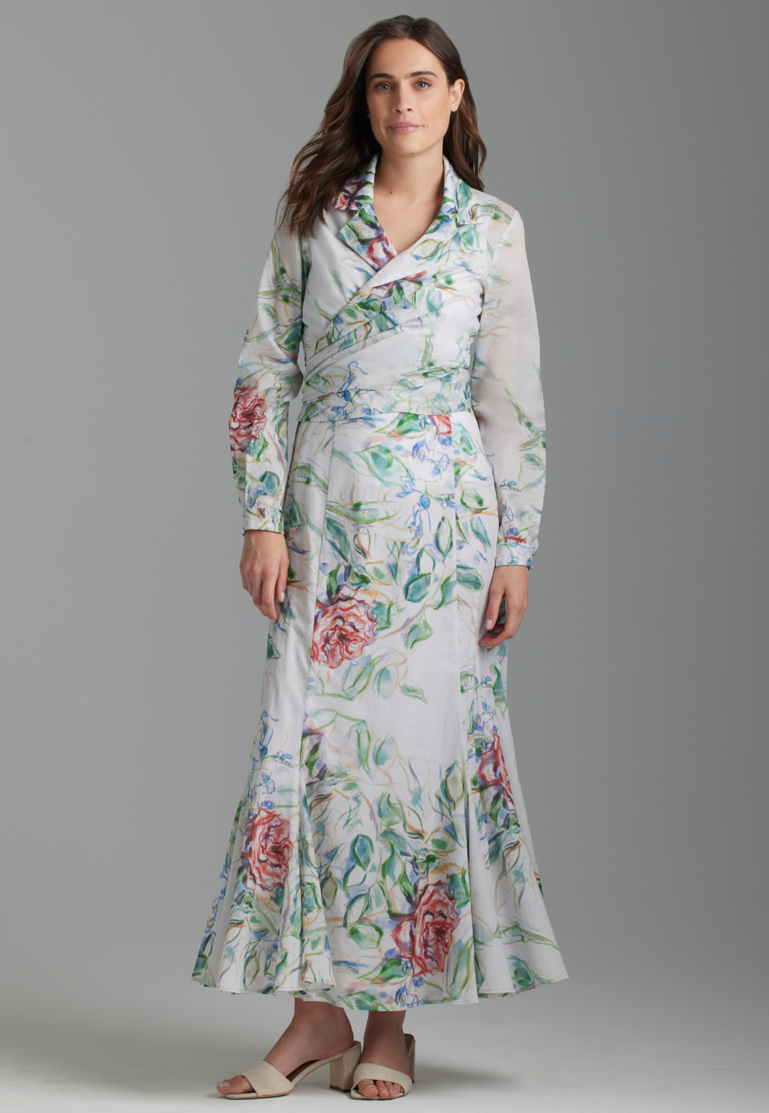 Woman wearing cotton wrap top and skirt in rose print by Ala von Auersperg for summer 2023