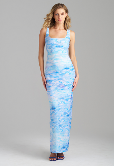 Woman wearing stretch knit ocean wave printed long dress by Ala von Auersperg for summer 2023