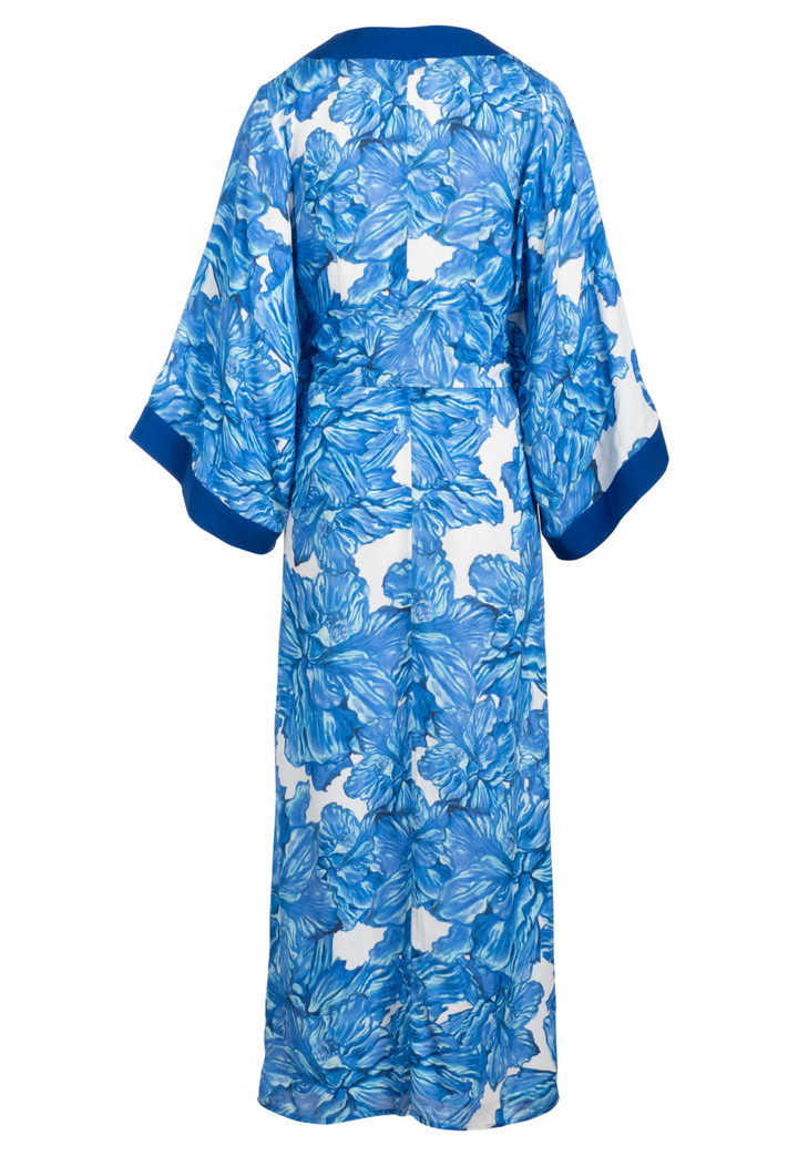 Flat image of blue floral printed silk kaftan by designer Ala von Auersperg for luxury women's fashion