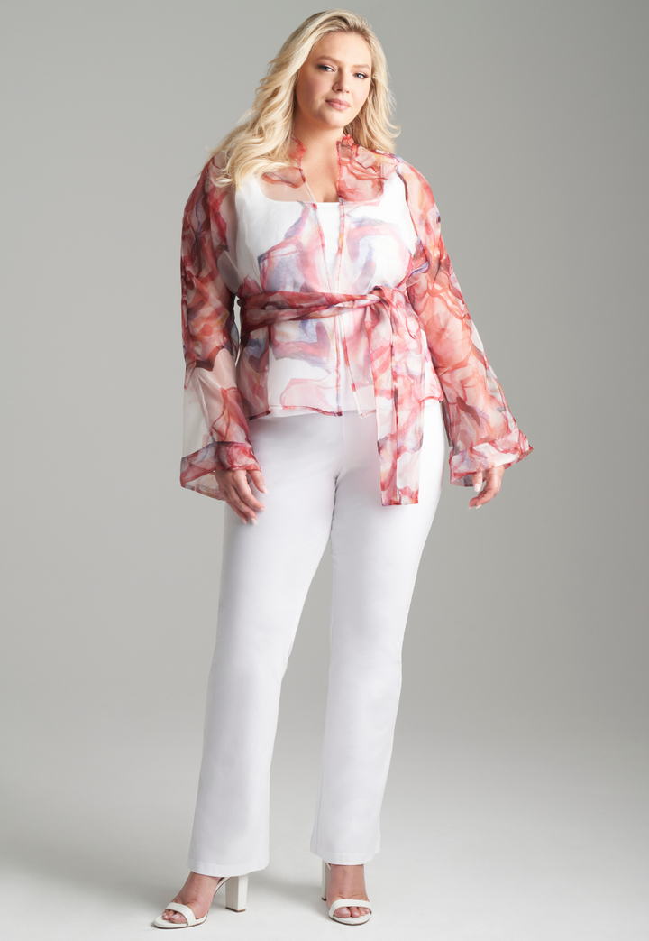 Woman wearing red rose printed silk organza kimono blouse with high neckline and belt over italian stretch cotton white tank top and pants by Ala von Auersperg