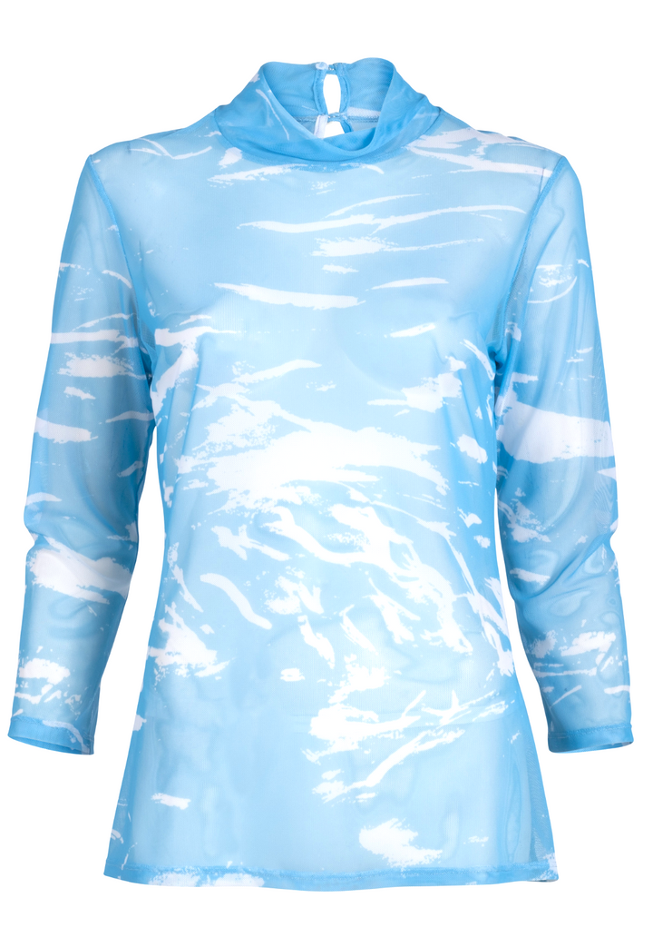 Woman wearing wave printed blue mesh turtleneck over stretch knit tank top and pants by Ala von Auersperg for summer 2023