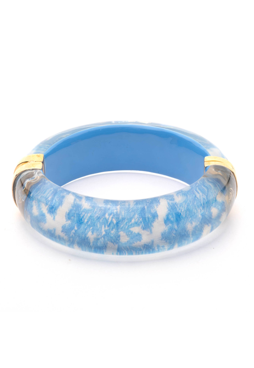 lucite bracelet in a blue coral print with 4K gold plated hardware