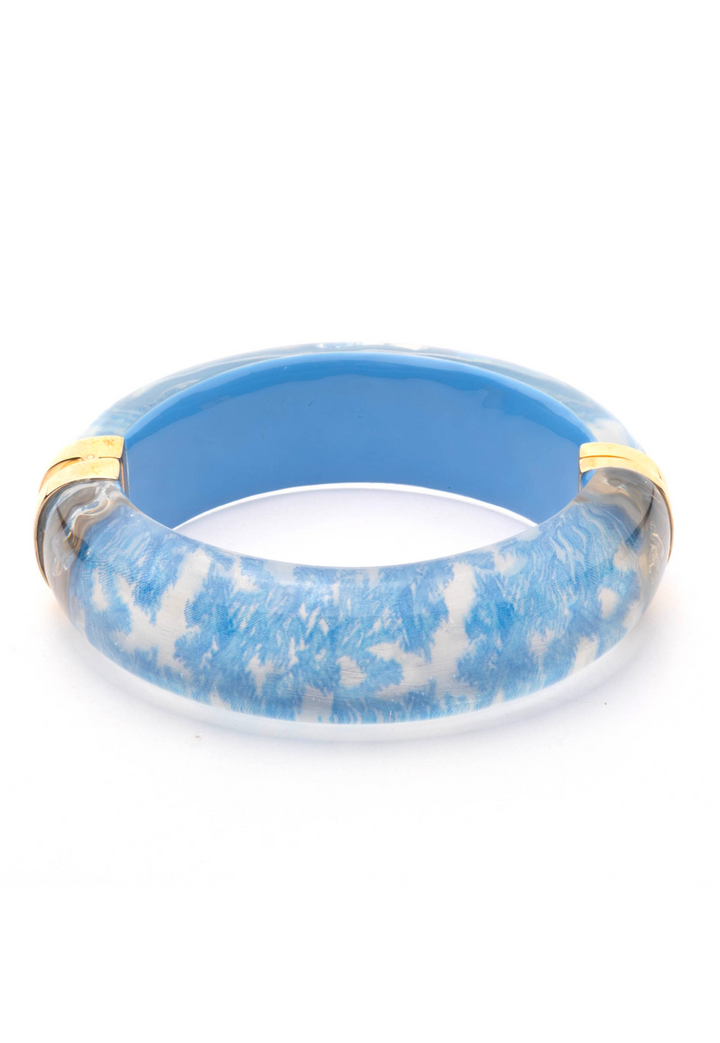 lucite bracelet in a blue coral print with 4K gold plated hardware