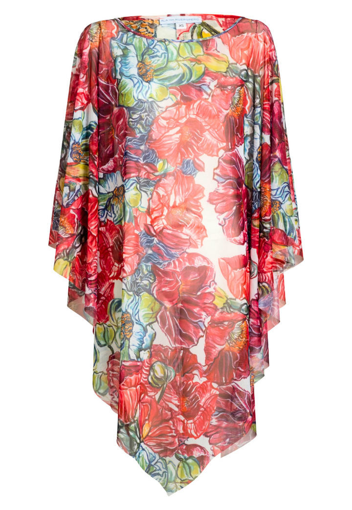 Image of a sheer mesh poncho cover up in a red floral print by designer Ala von Auersperg for womens luxury travel clothing