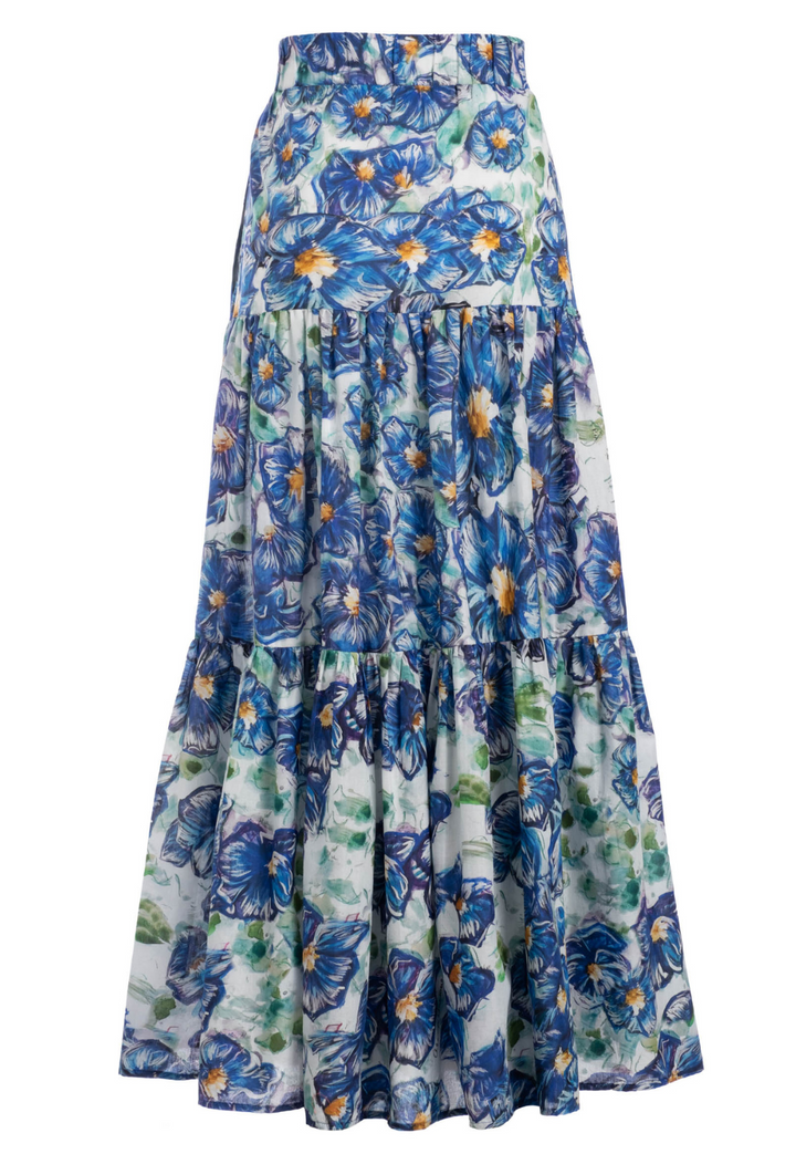 Flat image of a cotton maxi skirt in a blue floral print by designer Ala von Auersperg for womens luxury travel clothing