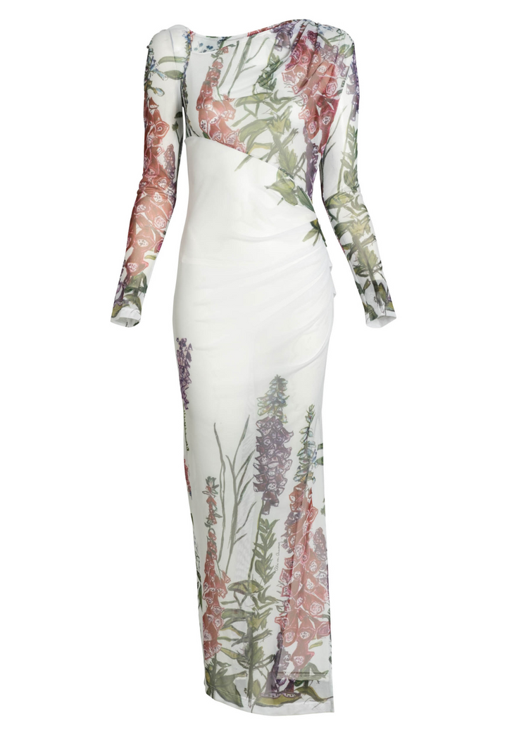 Flat image of an asymmetrical sheer mesh dress topper in a white floral print by designer Ala von Auersperg for womens luxury travel clothing