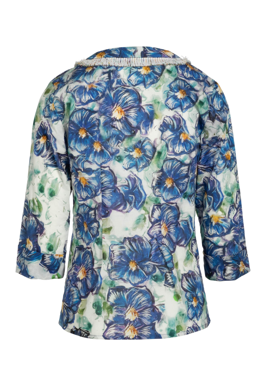 Flat image of a blue floral cotton tunic with fringe trim by designer Ala von Auersperg for womens luxury travel clothing