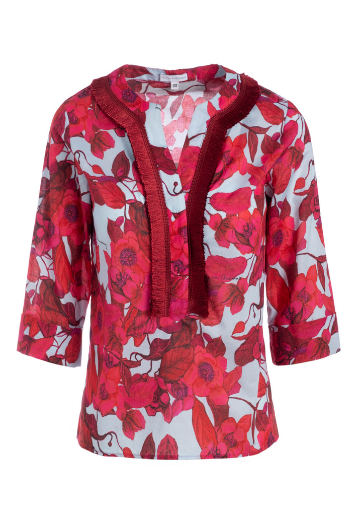 Flat image of a cotton tunic with italian fringe trim by designer Ala von Auersperg for womens luxury travel clothing