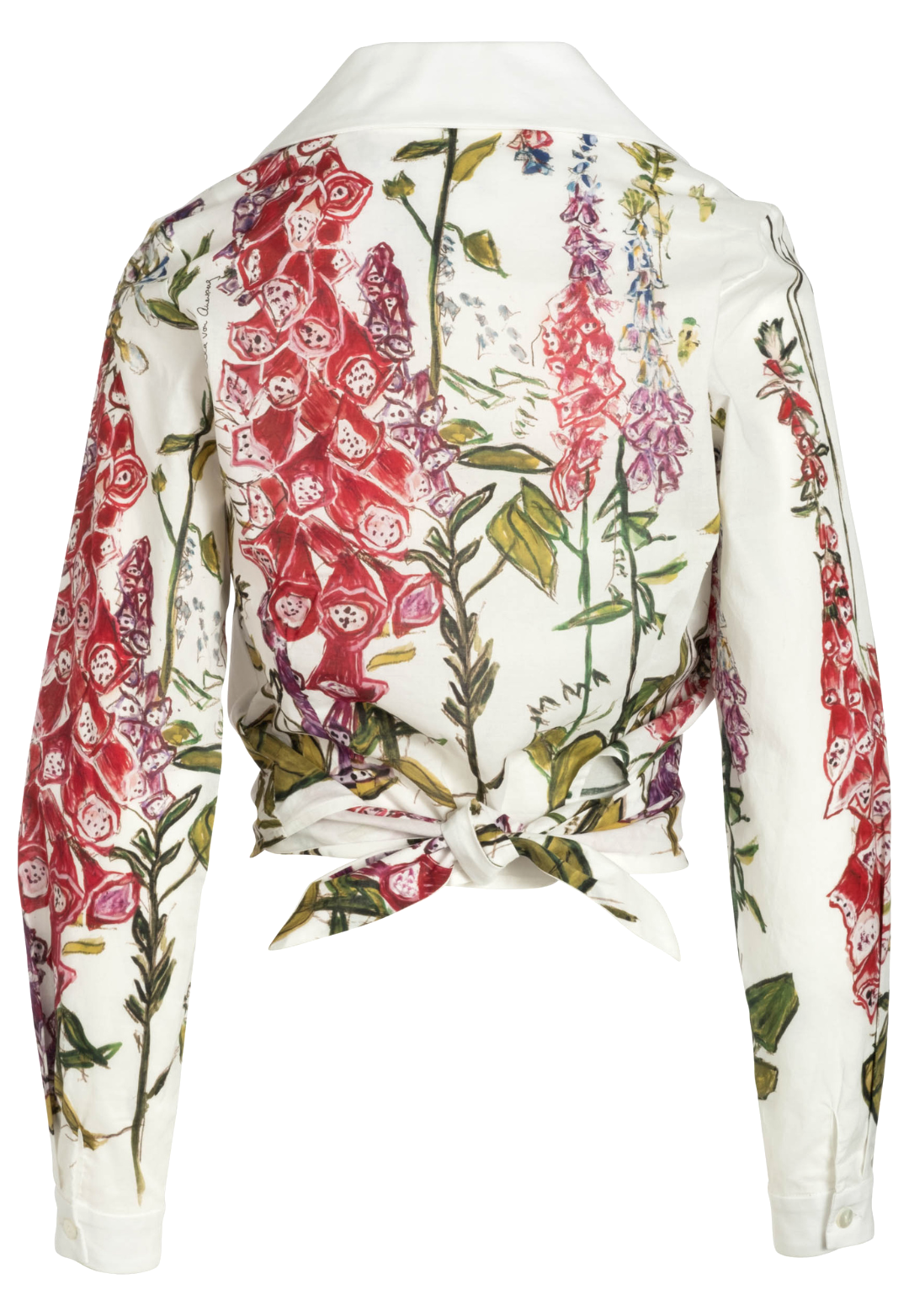 Flat image of the back of a cotton wrap top in a white floral print by designer Ala von Auersperg for womens luxury travel clothing
