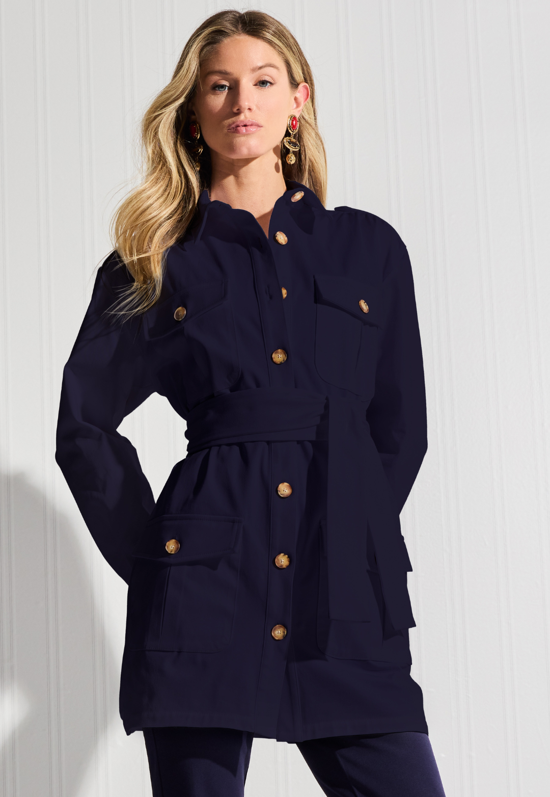 Woman wearing navy cotton safari jacket by designer Ala von Auersperg for womens luxury travel clothing