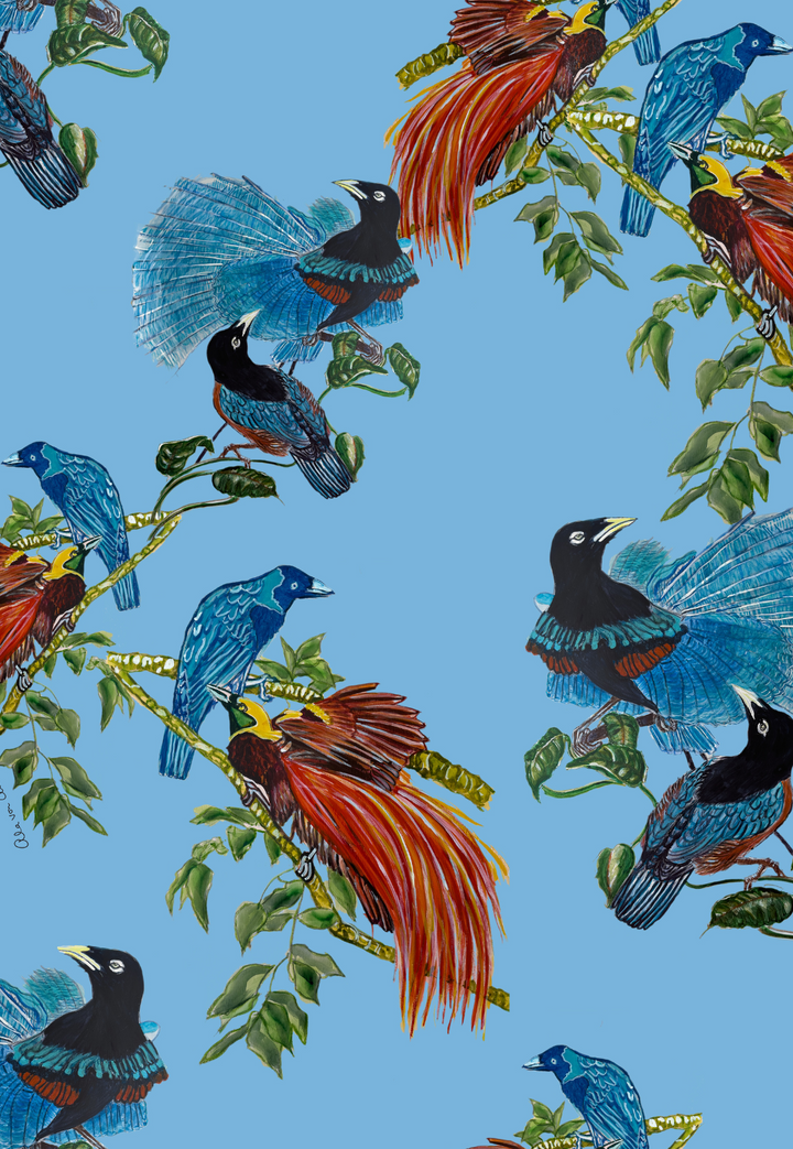 Tropical birds against a blue background print by designer Ala von Auersperg for womens luxury travel clothing