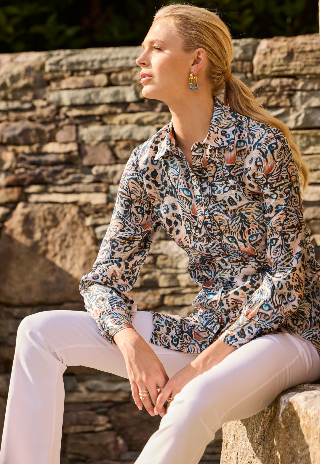 Woman wearing Alina silk blouse in Snow Leopard
