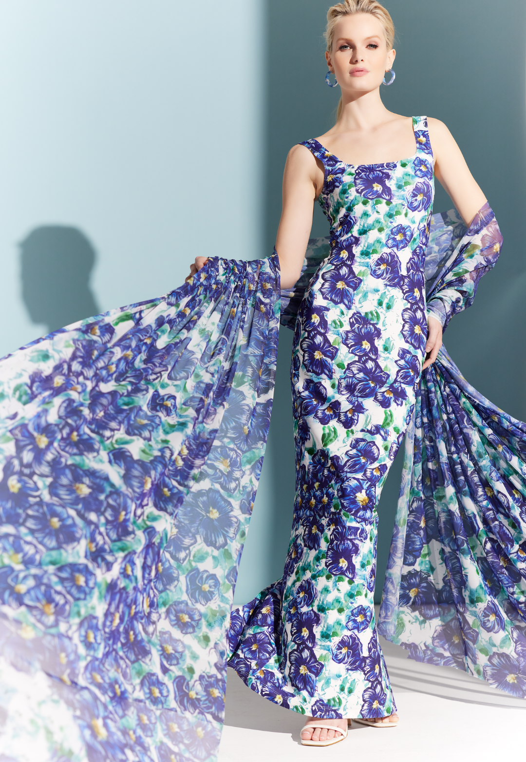 Woman wearing Caterina Blue Pansies stretch knit maxi dress