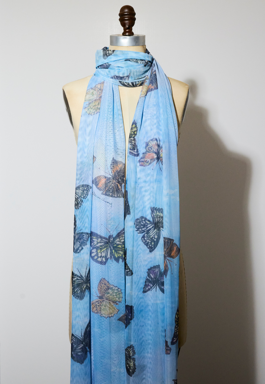 Blue butterfly print sheer mesh wrap by Ala von Auersperg