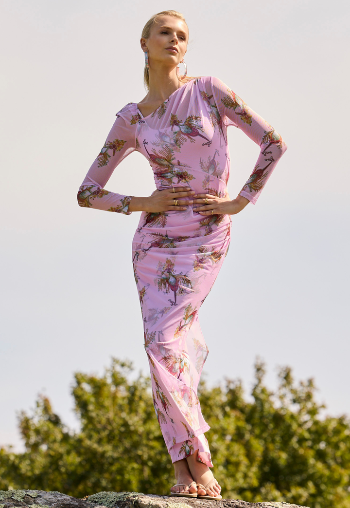 Woman wearing Geraldine sheer mesh dress in Cuckoo Bird