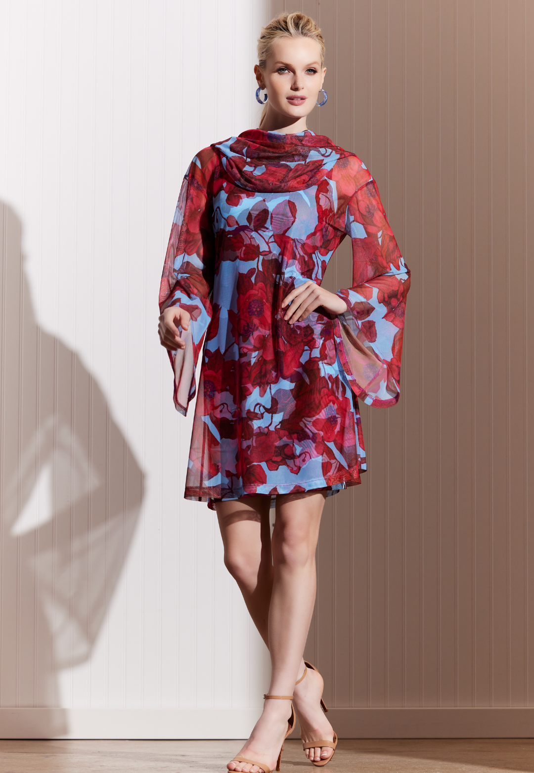 Woman wearing Karla Raspberry Grandiflora sheer mesh hoodie over matching mini dress