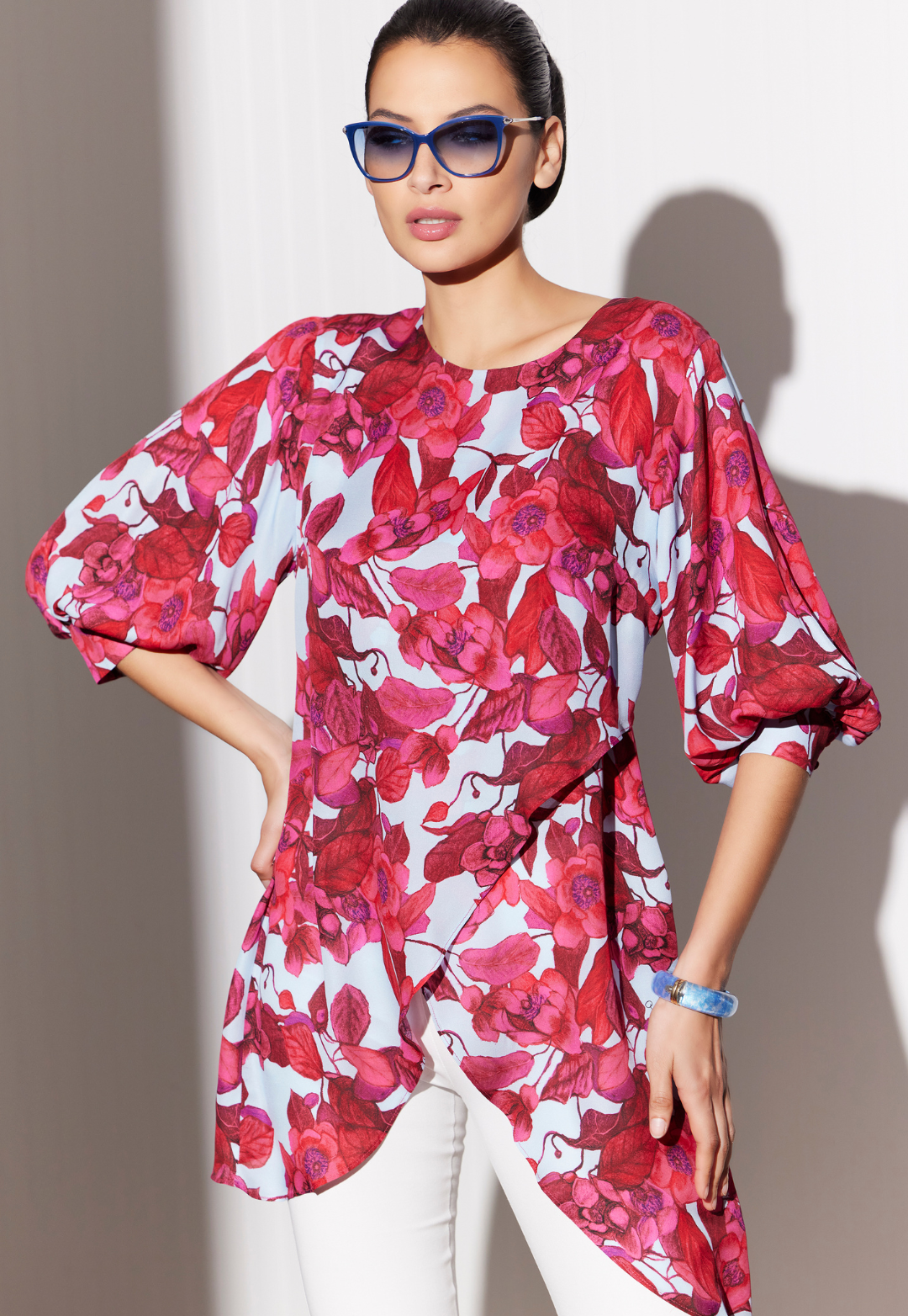 Woman wearing Katrina Raspberry Grandiflora red floral silk blouse