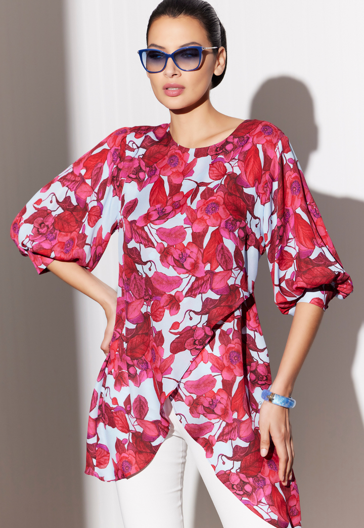 Woman wearing Katrina Raspberry Grandiflora red floral silk blouse