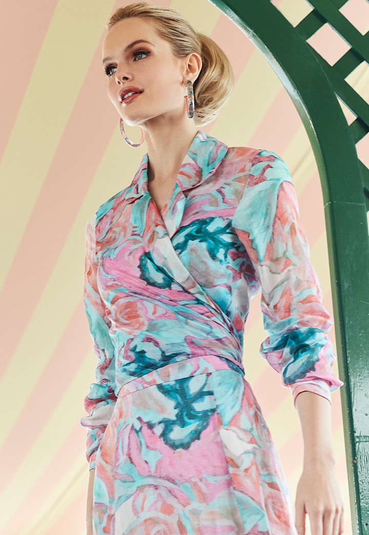 Woman wearing Phoebe White Daiquiri pink floral cotton wrap top