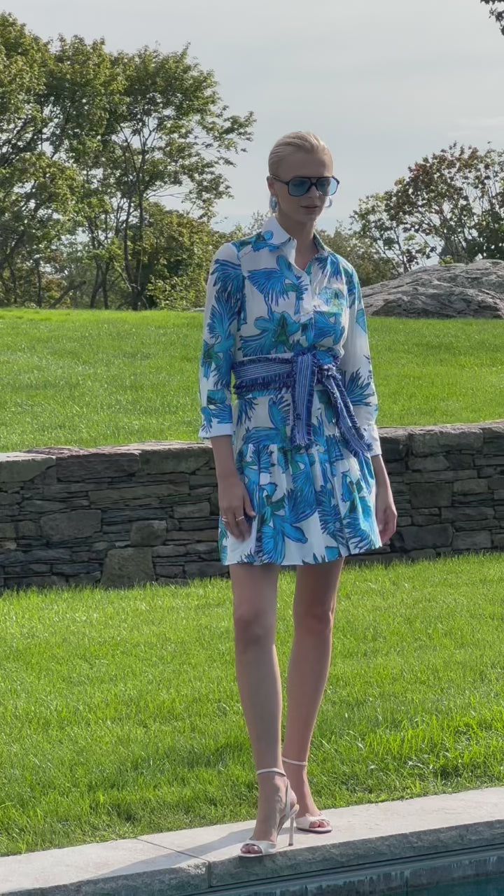 Woman wearing blue floral printed cotton dress
