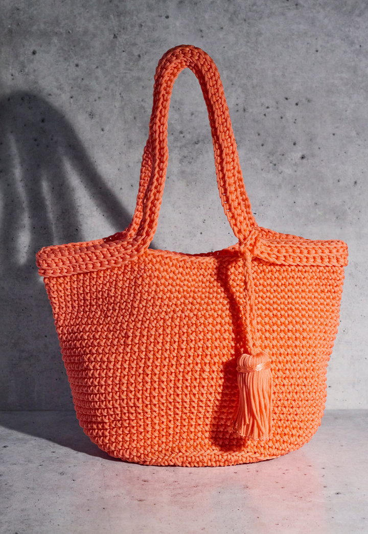 Rio large hand-crocheted bucket bag in Ecru with decorative tassel detail