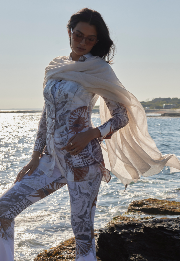Sheer Delicacy pale neutral cashmere shawl draped and tied at the front