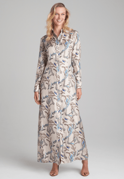 Woman wearing silk feather printed shirt dress by Ala von Auersperg for fall 2022