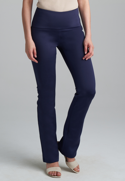 Woman wearing khaki stretch knit square neck tank top and stretch knit navy pants by Ala von Auersperg