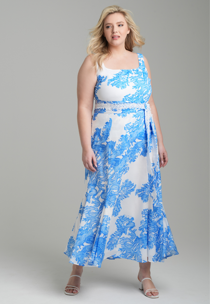 Woman wearing blue coral printed cotton voile long skirt with blue coral printed square neck stretch knit tank top by Ala von Auersperg for resort 2023