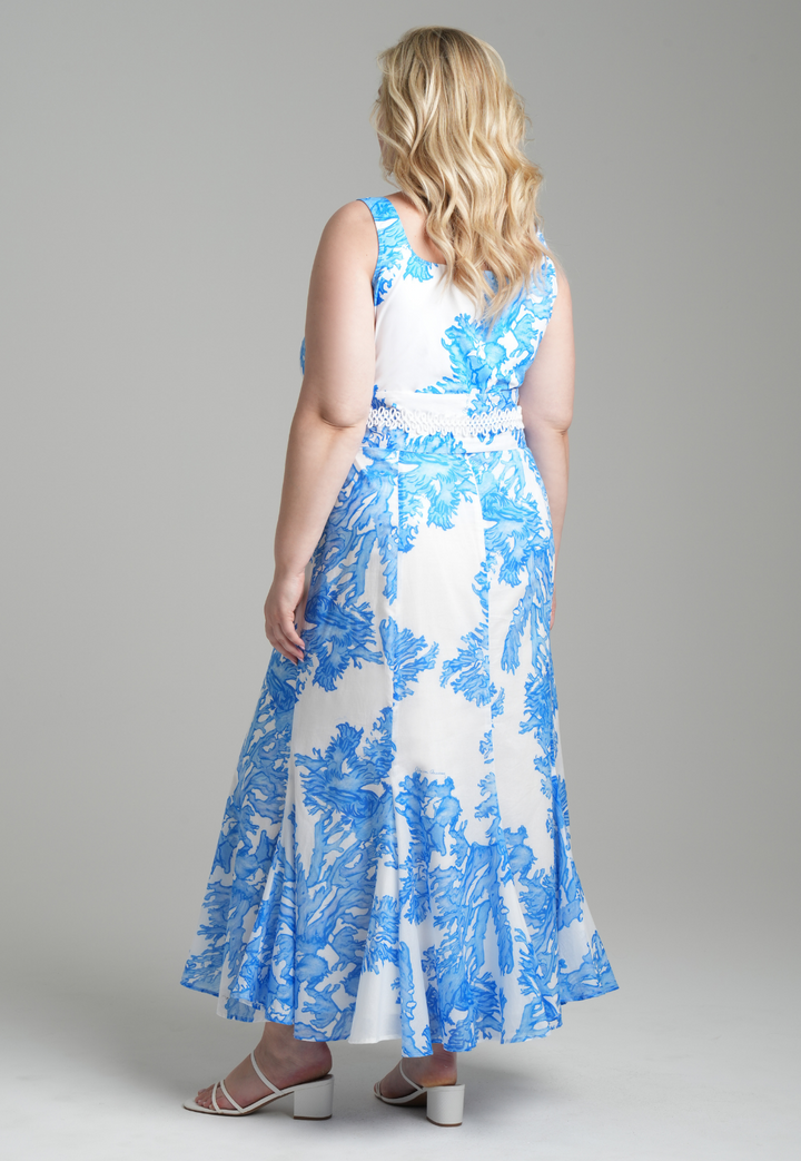 Woman wearing blue coral printed cotton voile long skirt with blue coral printed square neck stretch knit tank top by Ala von Auersperg for resort 2023