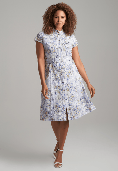 Woman wearing blue rose printed cotton eyelet short dress with belt by Ala von Auersperg for spring summer 2022