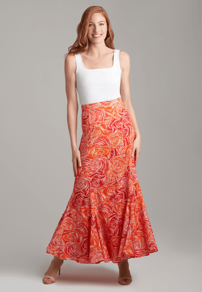 Woman wearing rose printed cotton eyelet long peasant skirt with italian stretch cotton square neck tank top by Ala von Auersperg for spring summer 2022