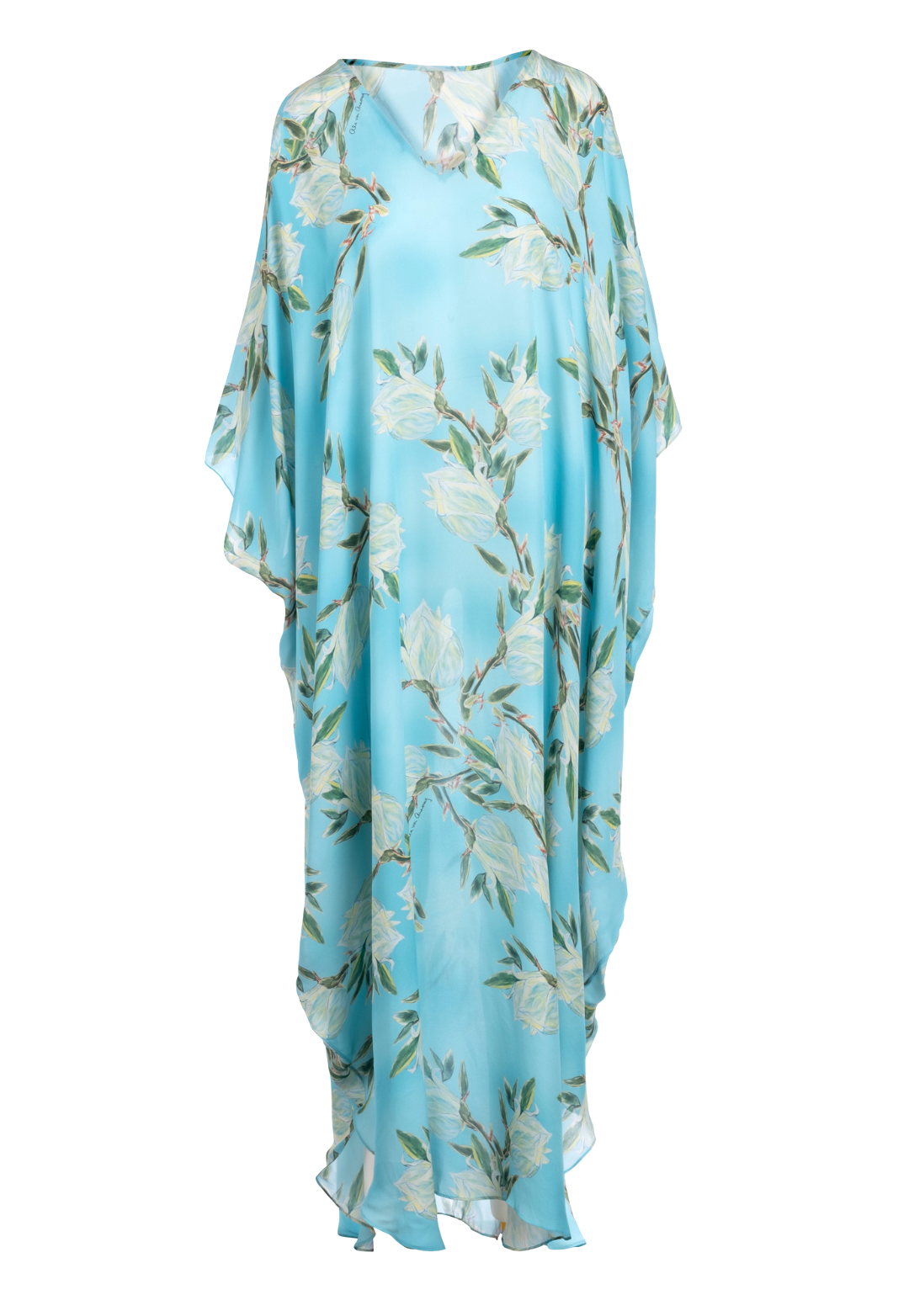Woman wearing blue silk yucca printed long kaftan with v neck by Ala von Auersperg for spring 2023