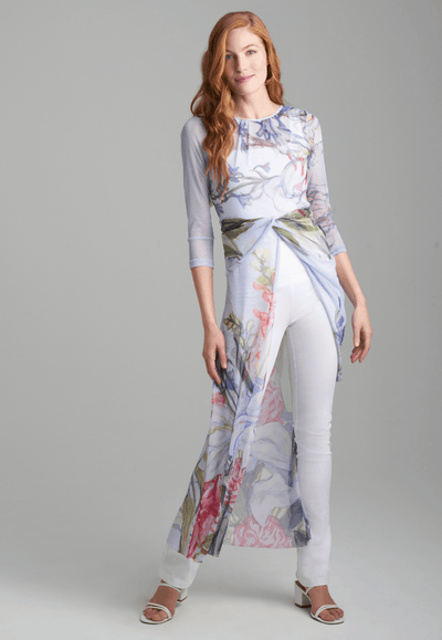 Woman wearing sheer mesh asymmetrical  floral bouquet printed topper over italian stretch cotton square neck tank and pants by Ala von Auersperg for spring summer 2022