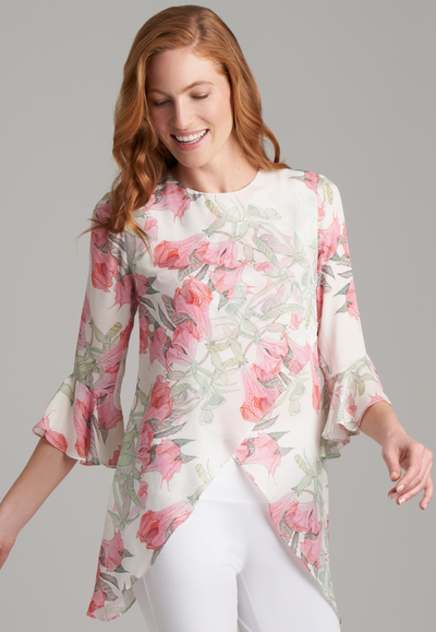 Woman wearing silk asymmetrical flower printed blouse by Ala von Auersperg for spring summer 2022