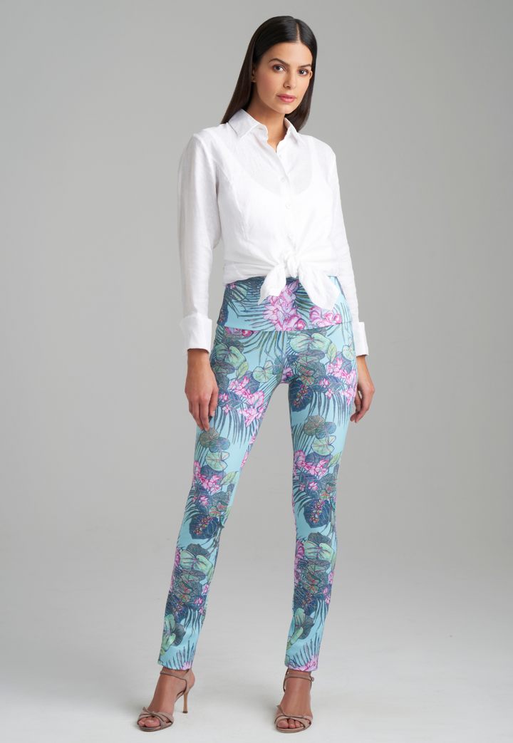 Model wearing white linen blouse with printed stretch knit pants
