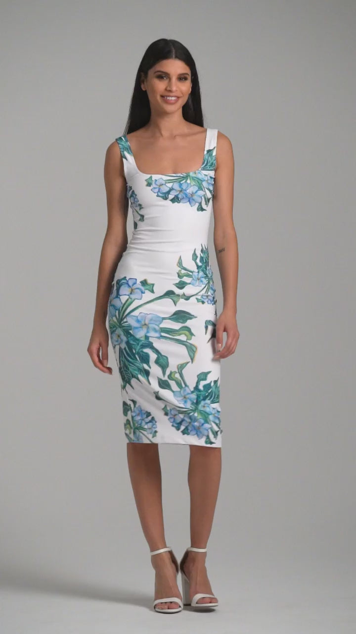 Woman wearing green mock coffee printed stretch knit short square neck dress by Ala von Auersperg for resort 2023