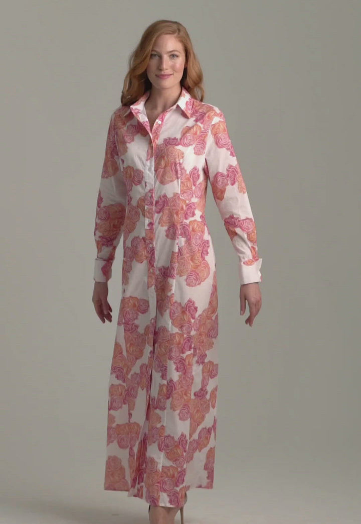 Woman wearing rose printed cotton shirt dress by Ala von Auersperg for spring summer 2022