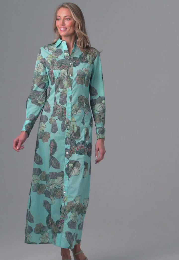 Woman wearing grape leave printed cotton green shirt dress