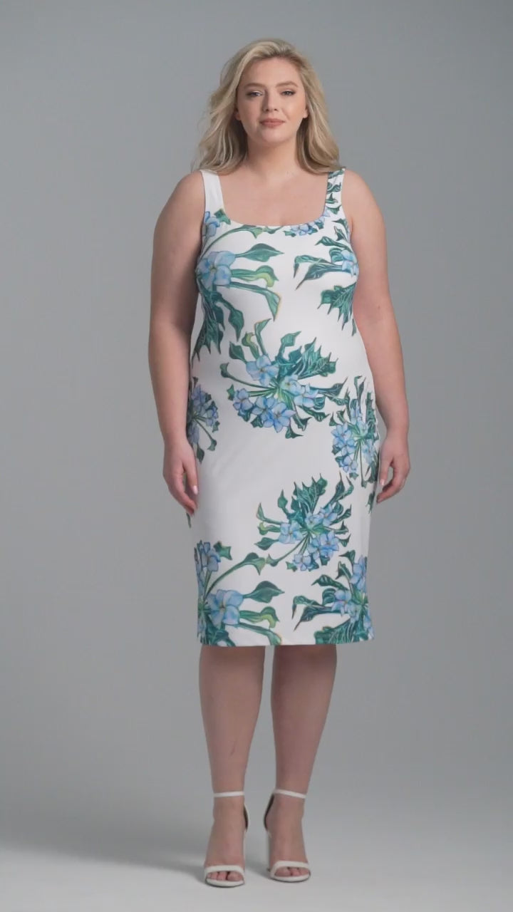 Woman wearing green mock coffee printed stretch knit short square neck dress by Ala von Auersperg for resort 2023