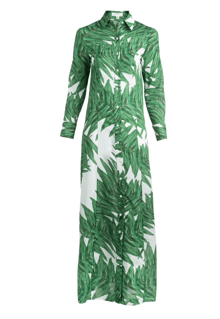 Woman wearing Kathe Queen Palm cotton dress with button-down front and collar